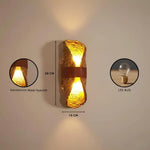 Wall-mounted light fixture with dimensions and bulb details on a neutral background