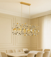 Daya Worldwide RAYLINE rectangle chandelier with sleek metal frame and modern design, hanging as a stylish lighting fixture in a contemporary space.