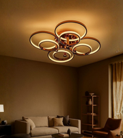 Eclat rosegold modern LED ceiling light adding warmth to elegant living space.
