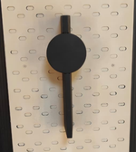 Daya Worldwide Lumina black and gold wall light mounted on a wall, stylish modern lighting fixture with sleek design.