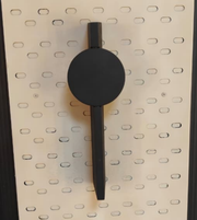 Daya Worldwide Lumina black and gold wall light mounted on a wall, stylish modern lighting fixture with sleek design.
