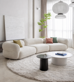 Daya Worldwide Curve Sofa with plush fabric upholstery and modern design, showcasing its sleek, curved shape and comfortable seating.
