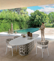 Daya Worldwide Liora outdoor dining set with a table and chairs, ideal for patio or garden outdoor dining spaces.