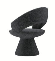Sculpted Daya Worldwide dining chair with ergonomic design, featuring a sleek curved backrest and cushioned seat.