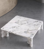 Daya Worldwide Caldera Coffee Table with a sleek, modern design featuring a smooth wooden surface and sturdy metal legs.