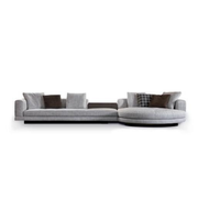 Daya Worldwide Luno Curve Sectional Sofa with plush cushions and modern design, showcasing its curved shape and stylish upholstery.