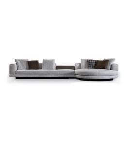 Daya Worldwide Luno Curve Sectional Sofa with plush cushions and modern design, showcasing its curved shape and stylish upholstery.