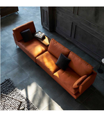 Daya Worldwide Linea Luxe leather sofa with sleek design and plush cushions, showcased in a modern living room setting.