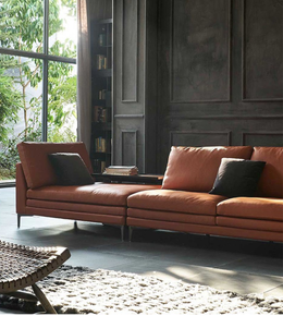 Daya Worldwide Linea Luxe leather sofa with sleek modern design, plush cushions, and smooth leather upholstery in a contemporary living room setting.