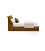 Daya Worldwide Haven Curve Bed with sleek, curved wooden frame and plush white bedding in a modern bedroom setting.