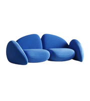 Daya Worldwide Pebble Curve Sofa with plush cushions and smooth curved design, perfect for modern living rooms.