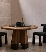 Round Orion dining table by Daya Worldwide with a smooth wooden surface and sturdy legs, ideal for modern dining spaces.