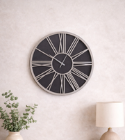 Noir Roman statement wall clock by Daya Worldwide with black finish and Roman numeral design, decorative wall decor.