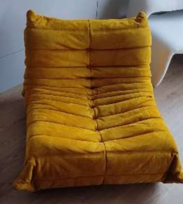 Daya Worldwide CATERPILLAR sofa with sleek modern design, plush cushions, and neutral upholstery in a contemporary living room setting.