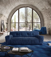 Modern Comfort sofa by Daya Worldwide featuring plush cushions and sleek fabric in a contemporary living room setting.