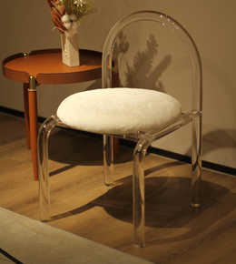 Clear frame chair by Daya Worldwide featuring transparent acrylic legs and a sleek modern design.
