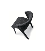 Modern arm dining chair with sleek design, wooden legs, and cushioned seat, perfect for contemporary dining rooms.
