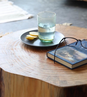 Light wood Log Coffee Table by Daya Worldwide with smooth, rounded log design perfect for modern living room decor.
