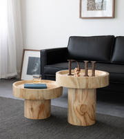 Round Daya Worldwide side table with a sleek wooden top and metal legs, perfect for living room or bedroom decor.
