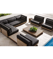 Daya Worldwide Horizon outdoor lounge set with cushioned seats, coffee table, and stylish outdoor furniture in a modern design.
