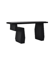 Elegant black obsidian sculpt console table with a sleek design, perfect for modern living spaces.