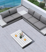 Outdoor modular lounge set by Daya Worldwide featuring stylish cushions and contemporary design for comfortable outdoor seating.