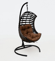 Outdoor hanging lounge chair by Daya Worldwide featuring a sturdy frame and cozy fabric seat for relaxing outdoors.