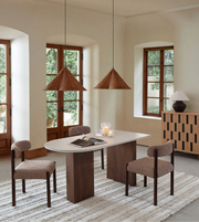 Daya Worldwide Ova Dining Set with a sleek dining table featuring a modern design and smooth wooden finish.