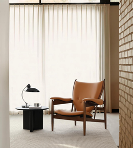 Daya Worldwide Vero lounge chair with sleek modern design, featuring plush cushioning and stylish wooden legs.