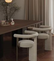 Daya Worldwide ARC dining chair with curved wooden backrest and cushioned seat, modern furniture for dining rooms.