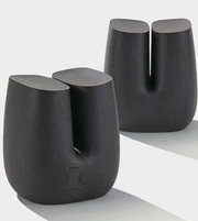 Pair of black curve side tables from Daya Worldwide, featuring sleek, modern design perfect for living room or bedroom decor.