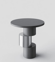 Modern round side table by Daya Worldwide, featuring a sleek design with a smooth tabletop and stylish base.
