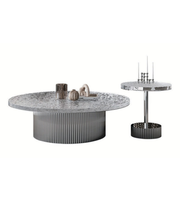 Hammered surface coffee and side tables set by Daya Worldwide, showcasing sleek, textured metal finishes and modern design.