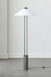 Minimalist floor lamp with fabric shade and slim metal stand