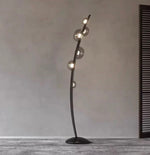 Elegant designer floor lamp creating ambient lighting in a luxury interior