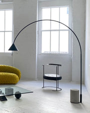 Decorative sculptural floor lamp with glowing orbs in contemporary space