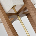 Close-up of textured fabric lampshade with wooden frame details