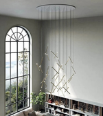 Modern interior with a large window, decorative wall lights, and a shelf.
