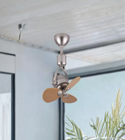 Ceiling fan with wooden blades mounted on a ceiling
