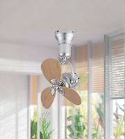 Ceiling fan with wooden propeller in a room with plants and windows