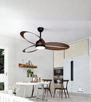 Ceiling fan in a modern kitchen with white walls and wooden shelves.