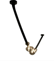 Modern pendant light with black metal fixture and glass shades on a white background