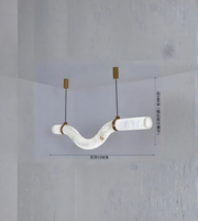 Modern pendant light fixture with white marble-like design on a gray background