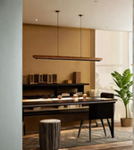 Slim wooden linear LED pendant light by Daya Worldwide hanging from ceiling, modern design for contemporary interior decor