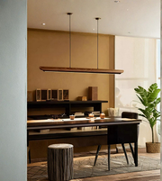 Slim wooden linear LED pendant light by Daya Worldwide hanging from ceiling, modern design for contemporary interior decor