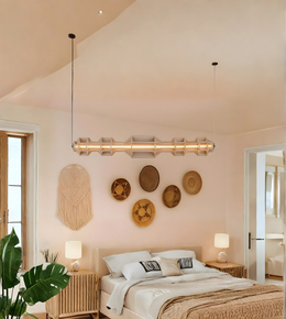 Modern bedroom with decorative wall art and a large bed.