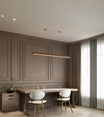 Modern kitchen with wooden cabinets, a dining table, and chairs.