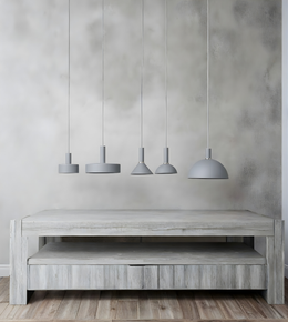 Wooden TV stand with four hanging pendant lights against a gray wall.
