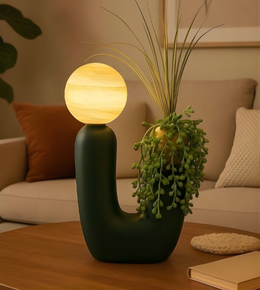 Decorative lamp with spherical light bulb on a wooden table in a cozy living room.