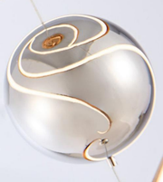 Modern pendant light fixture with a white and gold design on a white background